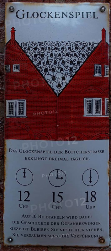 Glockenspiel sign, historic Böttcherstraße in the old town of the Hanseatic City of Bremen from the 1920s, times, frequency, three times a day, information, notice, sign, illustration, popular tourist destination