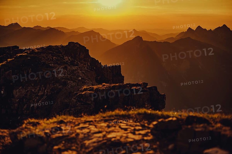 Thaneller summit at sunset in the Lechtal valley in Tyrol with a wonderful view of the surrounding mountains. Tyrol, Austria