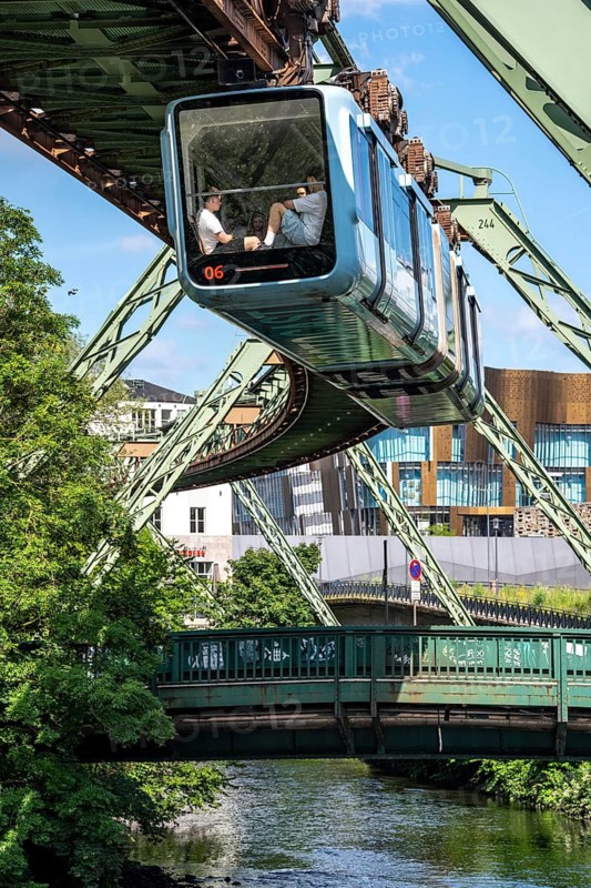 The Wuppertal suspension railway runs above along the Wupper River, between the central railway station stop and Ohligsmühle, Germany