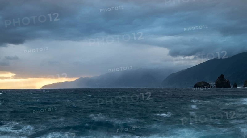 Sunrise, waves and rocks, coast near Porto Moniz, Madeira, Portugal