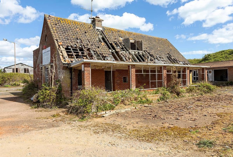 Derelict guardhouse building at former military base RAF Bawdsey, Bawdsey, Suffolk, England, UK