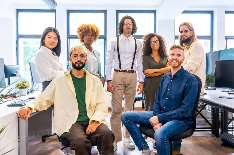 Portrait of a multi-ethnic and young members of a coworking posing together