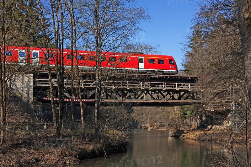 A heritage-protected railway bridge from the 19th century on the right is Pegnitz, above a regional railway, Velden, Middle Franconia, Bavaria, Germany