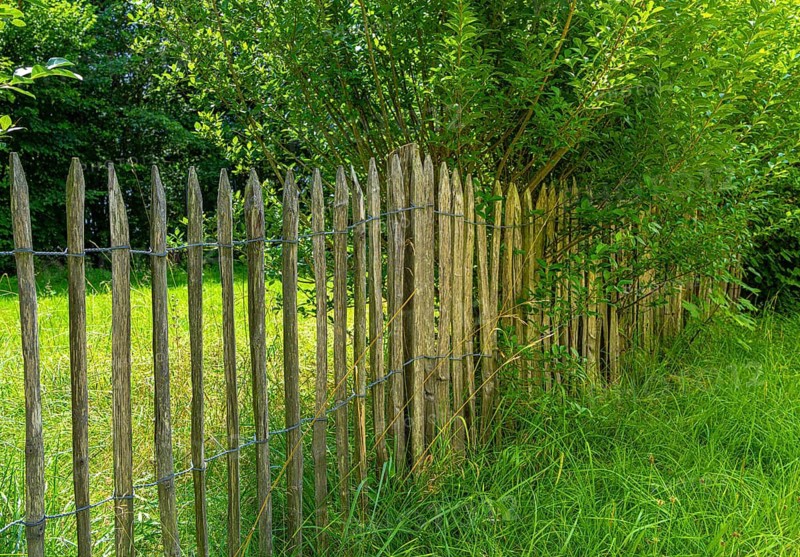 Wooden fence on a garden plot, Bavaria, Germany