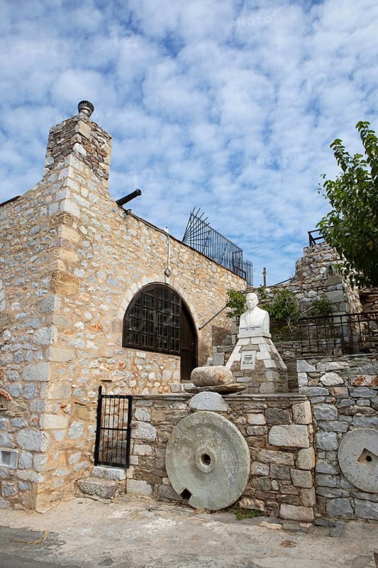 Bust and tower house in Vathia, historic stone houses, Mani Peninsula, Laconia, Peloponnese, Greece