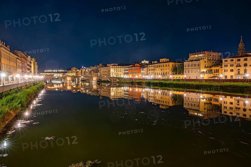 Promenade with arno river in front at blue hour, Florence, UNESCO World Heritage Site, Tuscany, Italy