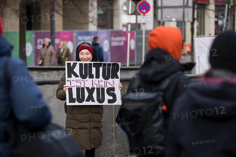 A woman holds a sign Culture is not a luxury at the #unkürzbar! Demonstration against the Berlin Senate's austerity plans, Berlin, 15.12.2024. The Senate plans to cut around 10% of Berlin's 2025 budget, including in the areas of culture, education, transport and climate protection