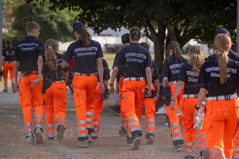 Members of the Düsseldorf Traffic Cadets, the youth organization of Verkehrswacht Düsseldorf, volunteers, to secure traffic for the safety of visitors, at major events, such as here at the Rheinkirmes, North Rhine-Westphalia, Germany