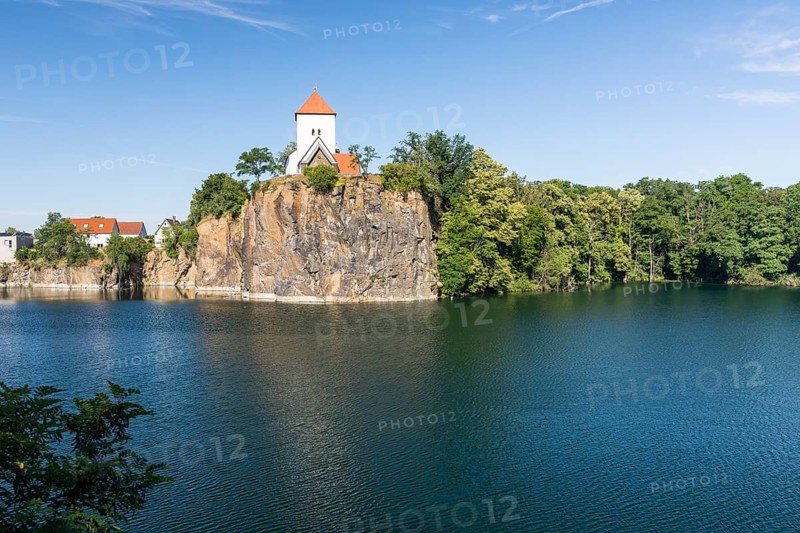 Kirchbruch lake and mountain church with water tower, Beucha, Leipzig district, Saxony, Germany