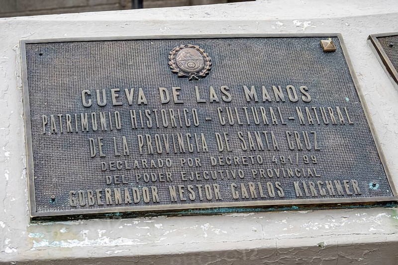Information sign at the Cueava de las Manos, prehistorical cave painting, historic monument and Unesco World Heritag, Argentina
