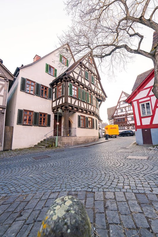 Snow-covered half-timbered houses on a cobbled street, Sindelfingen, Böblingen district, Germany