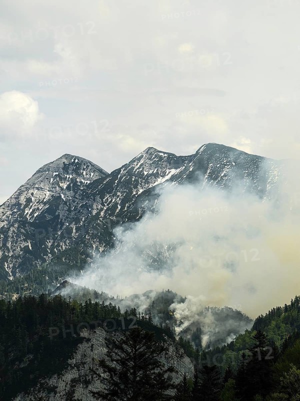 Forest fire on Saurüsselkopf in the Eastern Chiemgau Alps nature reserve on May 4, 2026, the Sonntagshorn in the background, Laubau, Bavaria, Germany