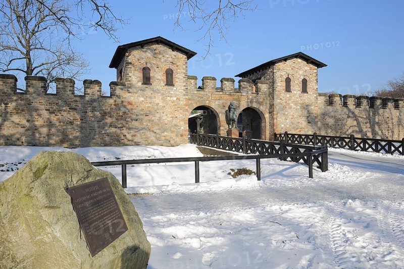 Roman UNESCO fort Saalburg in winter with snow, portal with towers, Upper Germanic Rhaetian Limes, Bad Homburg, Taunus, Hesse, Germany