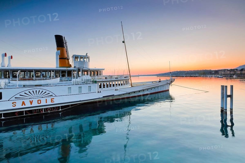 Anchored steamship Savoie at dawn in the mirror-smooth Geneva harbour basin, Canton Geneva, Switzerland