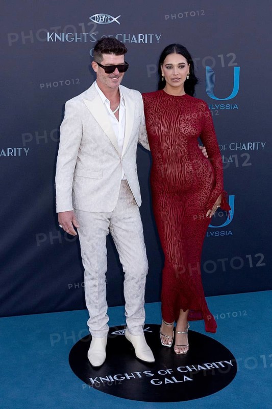Cannes, France - 22.5.2024: Robin Thicke and April Love Geary at the Knights of Charity Gala at Palm Beach in Cannes during the 77th Cannes International Film Festival. The 77th Cannes International Film Festival will take place from 14 to 25 May 2024