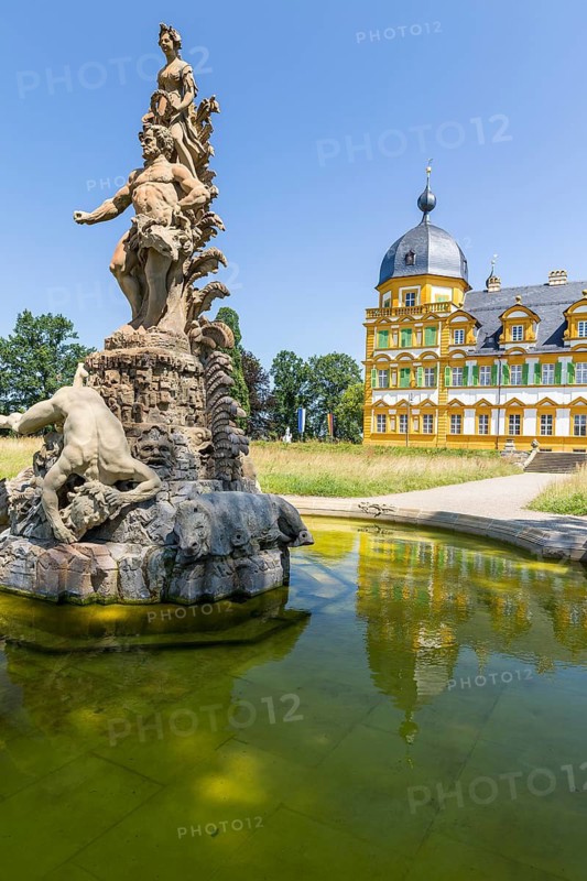 Park view of Seehof Castle with reflection in a water basin of the cascade, Hercules Group by Ferdinand Tietz, Memmelsdorf near Bamberg, Bavaria, Germany