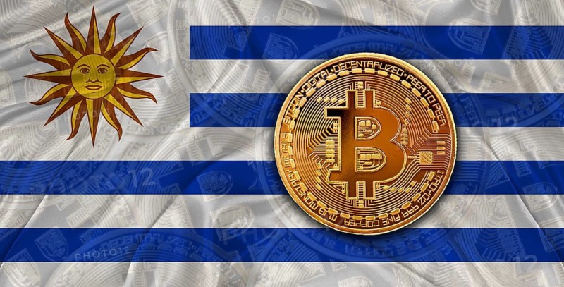 Investors in Blockchain Technology with Uruguay flag background. Bitcoin cryptocurrency with Uruguayan flag