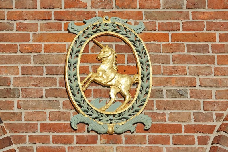 Golden unicorn as city coat of arms, Bürgerhaus Schranne, Giengen an der Brenz, Swabian Jura, Baden-Württemberg, Germany