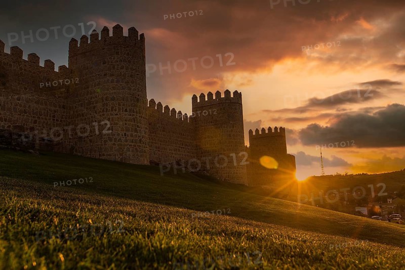 Avila city wall one afternoon with a beautiful sunset, Spain