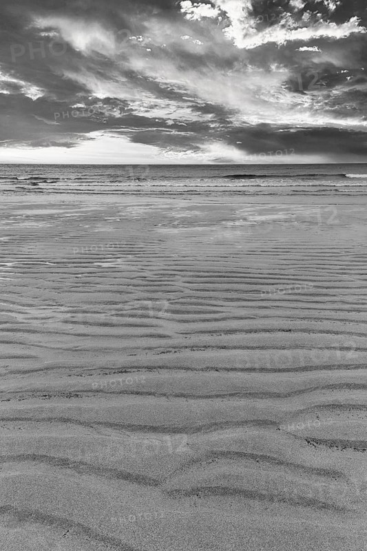 Coastline, sandy beach, sand ripples, dramatic cloudy sky, monochrome, Sennen Cove, Whitesand Bay, Cornwall, England, Great Britain
