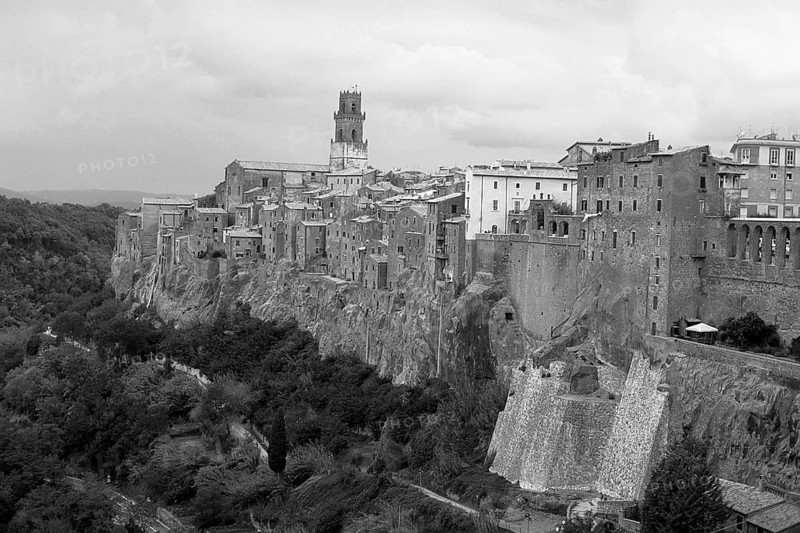 Pitigliano, ancient Etruscan town built on tuff stone, mentioned in 1061, black and white, Tuscany, Italy
