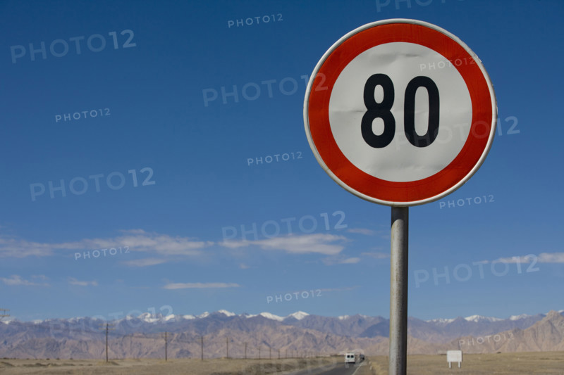 speed limit signs on road in Qinghai