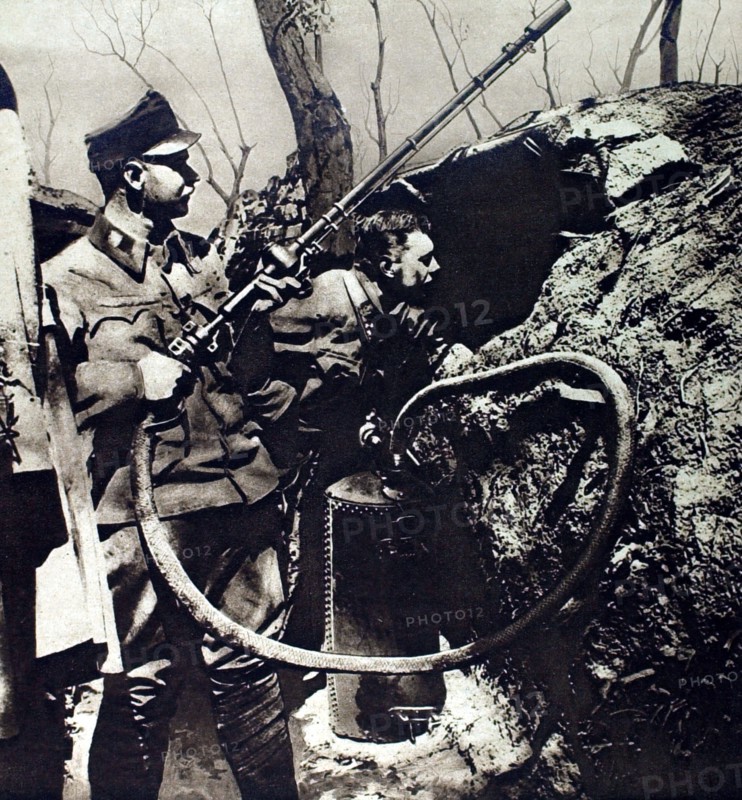 Austrian soldiers on the eastern front preparing to throw burning liquids
