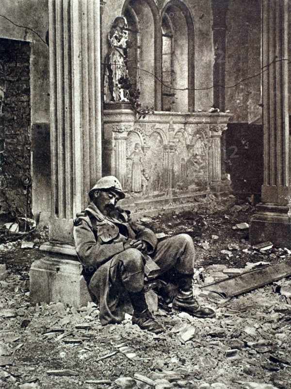 On the Woëvre front, a soldier asleep in a ruined church