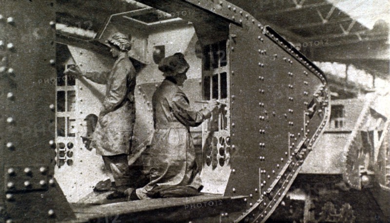 World War I. In England, women painting the inside of a tank