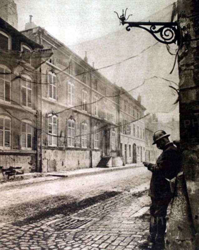 World War I. A camouflaged street in a village near the front