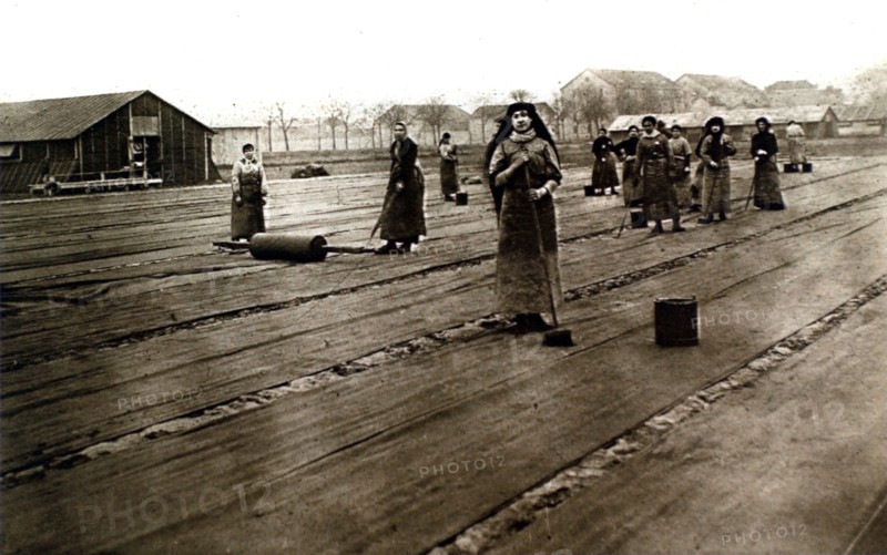 World War I. Americans preparing canvases to camouflage roads