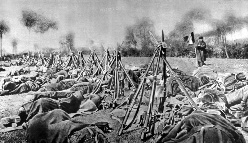 World War I. An exhausted Belgian regiment sleeping on the side of the road after the attack of Steenstraete  (1915)