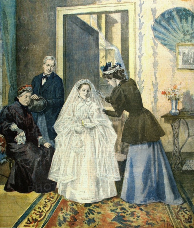 A young girl about to make her first communion getting dressed (1894)