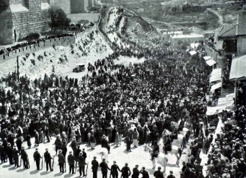 Arab pilgrimage to "Nébi Moussa" (the prophet Moses) passing beneath the walls of Jerusalem (1930)