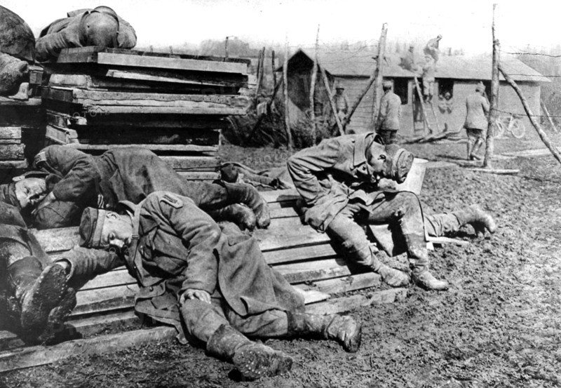 World War I. After the battle, exhausted German prisoners sleeping upon their arrival at camp