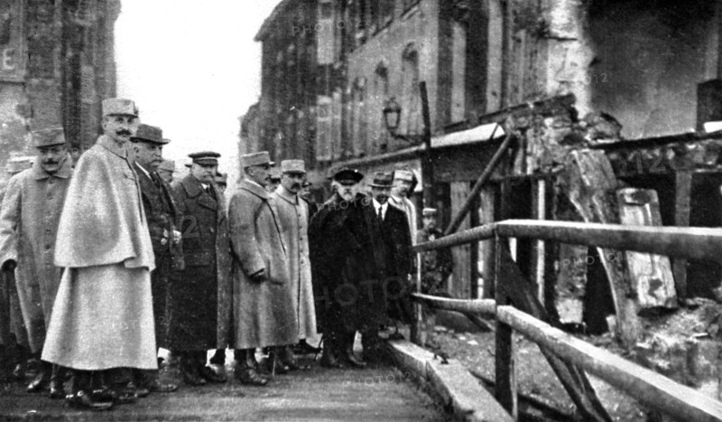 World War I. French President Raymond Poincaré visiting the town of Pont-à-Mousson which underwent 178 bombardments (1915)