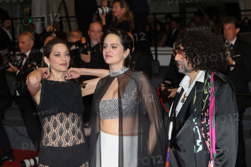 Marion Cotillard (in custom Chanel), Bertrand Mandico, Noémie Merlant (in custom Louis Vuitton)  attend the "Roma Elastica" screening during the 79th annual Cannes Film Festival at Palais des Festivals on May 20, 2026 in Cannes, France.
