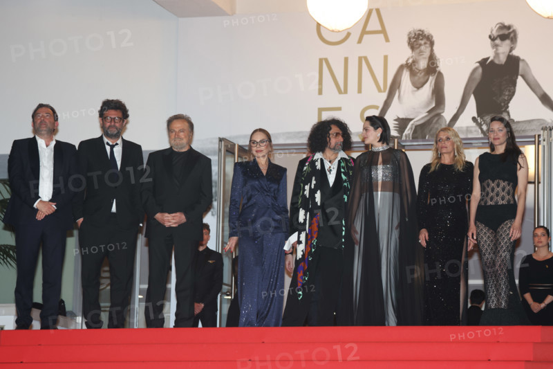 Mathieu Verhaeghe, Thomas Verhaeghe, Franco Nero, Ornella Muti (in Solangel), Bertrand Mandico, Noémie Merlant (in custom Louis Vuitton), Isabella Ferrari (in custom Saint Laurent) and Marion Cotillard (in custom Chanel) attend the "Roma Elastica" screening during the 79th annual Cannes Film Festival at Palais des Festivals on May 20, 2026 in Cannes, France