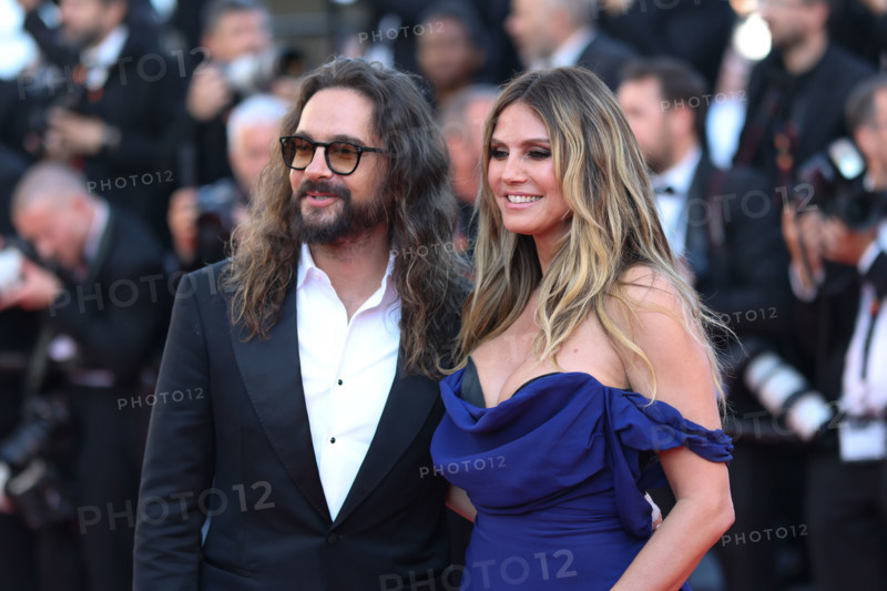 Heidi Klum (in Vivienne Westwood) and Tom Kaulitz attend the "La Bataille De Gaulle: L'Âge De Fer" (De Gaulle: Tilting Iron) screening during the 79th annual Cannes Film Festival at Palais des Festivals on May 20, 2026 in Cannes, France.