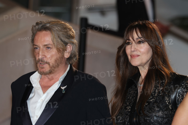 Benoit Magimel and Monica Bellucci (in Fendi) attends the "Histoires De La Nuit" (The Birthday Party) screening during the 79th annual Cannes Film Festival at Palais des Festivals on May 22, 2026 in Cannes, France.