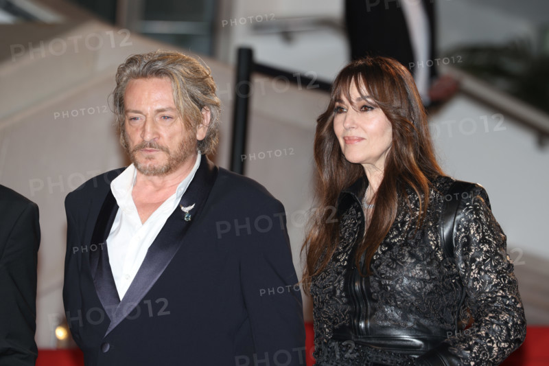 Benoit Magimel and Monica Bellucci (in Fendi) attends the "Histoires De La Nuit" (The Birthday Party) screening during the 79th annual Cannes Film Festival at Palais des Festivals on May 22, 2026 in Cannes, France.