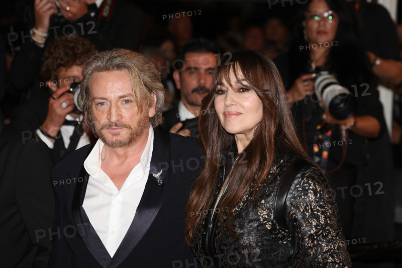 Benoit Magimel and Monica Bellucci (in Fendi) attends the "Histoires De La Nuit" (The Birthday Party) screening during the 79th annual Cannes Film Festival at Palais des Festivals on May 22, 2026 in Cannes, France.
