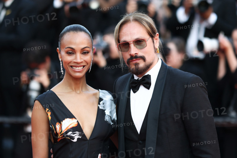 Zoe Saldaña (in Chanel) and Marco Perego attend the closing ceremony of the 79th annual Cannes Film Festival at Palais des Festivals on May 23, 2026 in Cannes, France