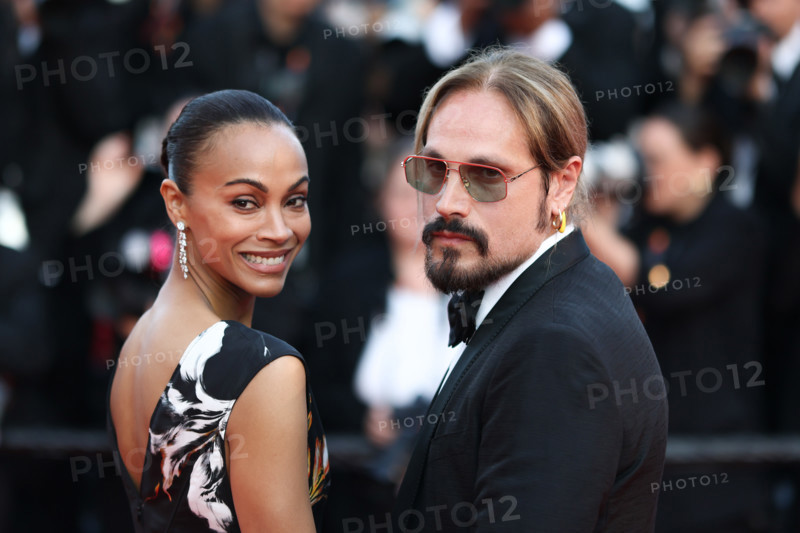 Zoe Saldaña (in Chanel) and Marco Perego attend the closing ceremony of the 79th annual Cannes Film Festival at Palais des Festivals on May 23, 2026 in Cannes, France