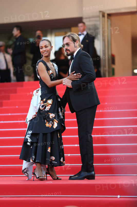 Zoe Saldaña (in Chanel) and Marco Perego attend the closing ceremony of the 79th annual Cannes Film Festival at Palais des Festivals on May 23, 2026 in Cannes, France