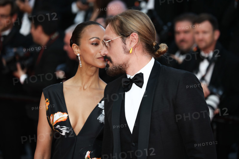Zoe Saldaña (in Chanel) and Marco Perego attend the closing ceremony of the 79th annual Cannes Film Festival at Palais des Festivals on May 23, 2026 in Cannes, France