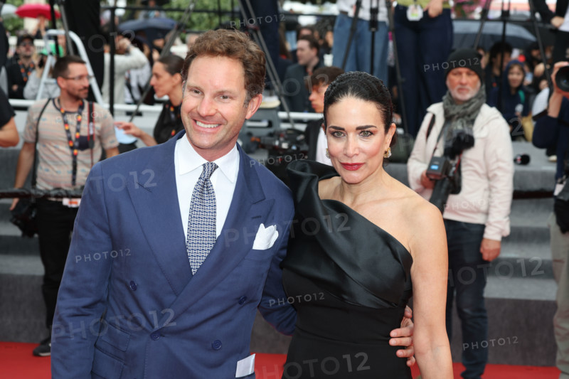 Marco Colombo and Randi Ingerman attend the "L'Inconnue" (The Unknown) screening during the 79th annual Cannes Film Festival at Palais des Festivals on May 18, 2026 in Cannes, France.