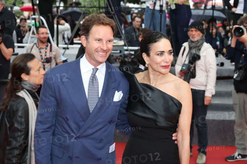 Marco Colombo and Randi Ingerman attend the "L'Inconnue" (The Unknown) screening during the 79th annual Cannes Film Festival at Palais des Festivals on May 18, 2026 in Cannes, France.