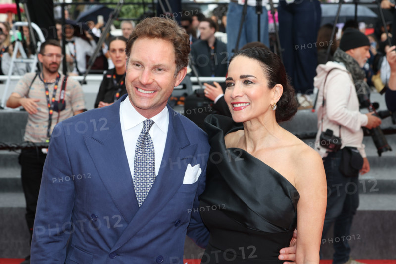 Marco Colombo and Randi Ingerman attend the "L'Inconnue" (The Unknown) screening during the 79th annual Cannes Film Festival at Palais des Festivals on May 18, 2026 in Cannes, France.