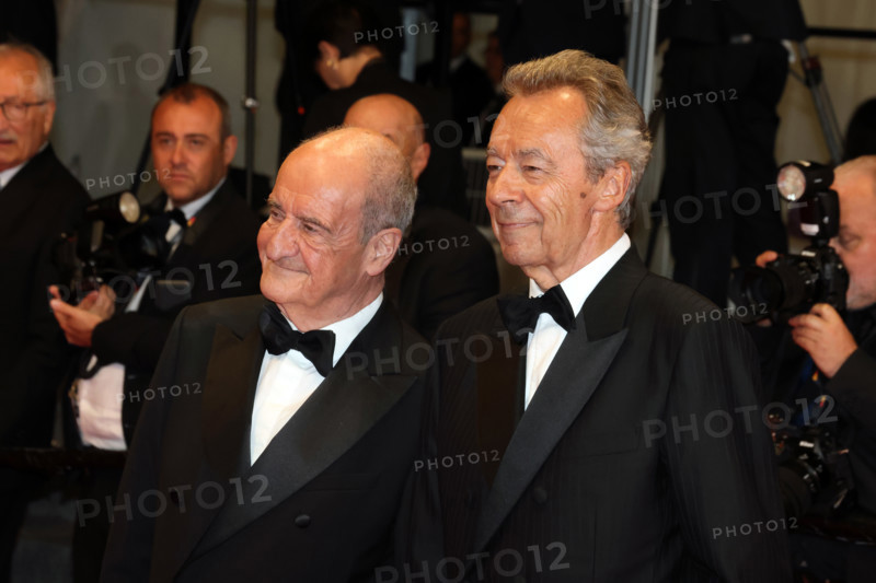 Michel Denisot and Pierre Lescure attend the "Coward" screening during the 79th annual Cannes Film Festival at Palais des Festivals on May 21, 2026 in Cannes, France.
